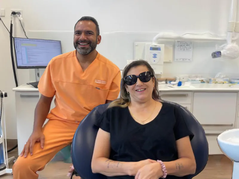 Dr Faris Kirmani with happy female patient